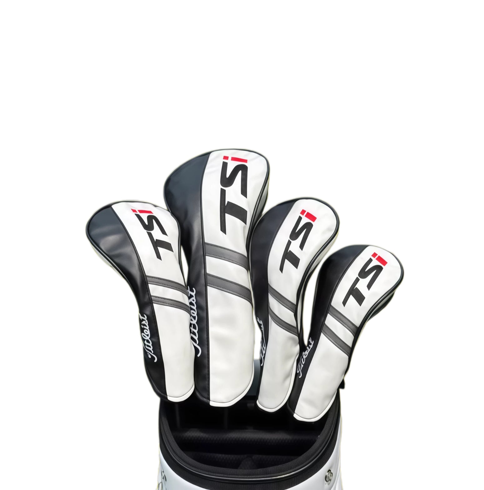Four Titleist TSi golf driver and fairway headcovers in white and black with red TSi logo and Titleist script