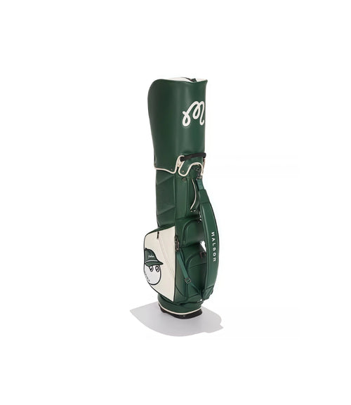 Green and white 2026 Malbon golf stand bag displayed with its cartoon mascot patch, showcasing waterproof design, large capacity, and a fashionable unisex style for golf enthusiasts.