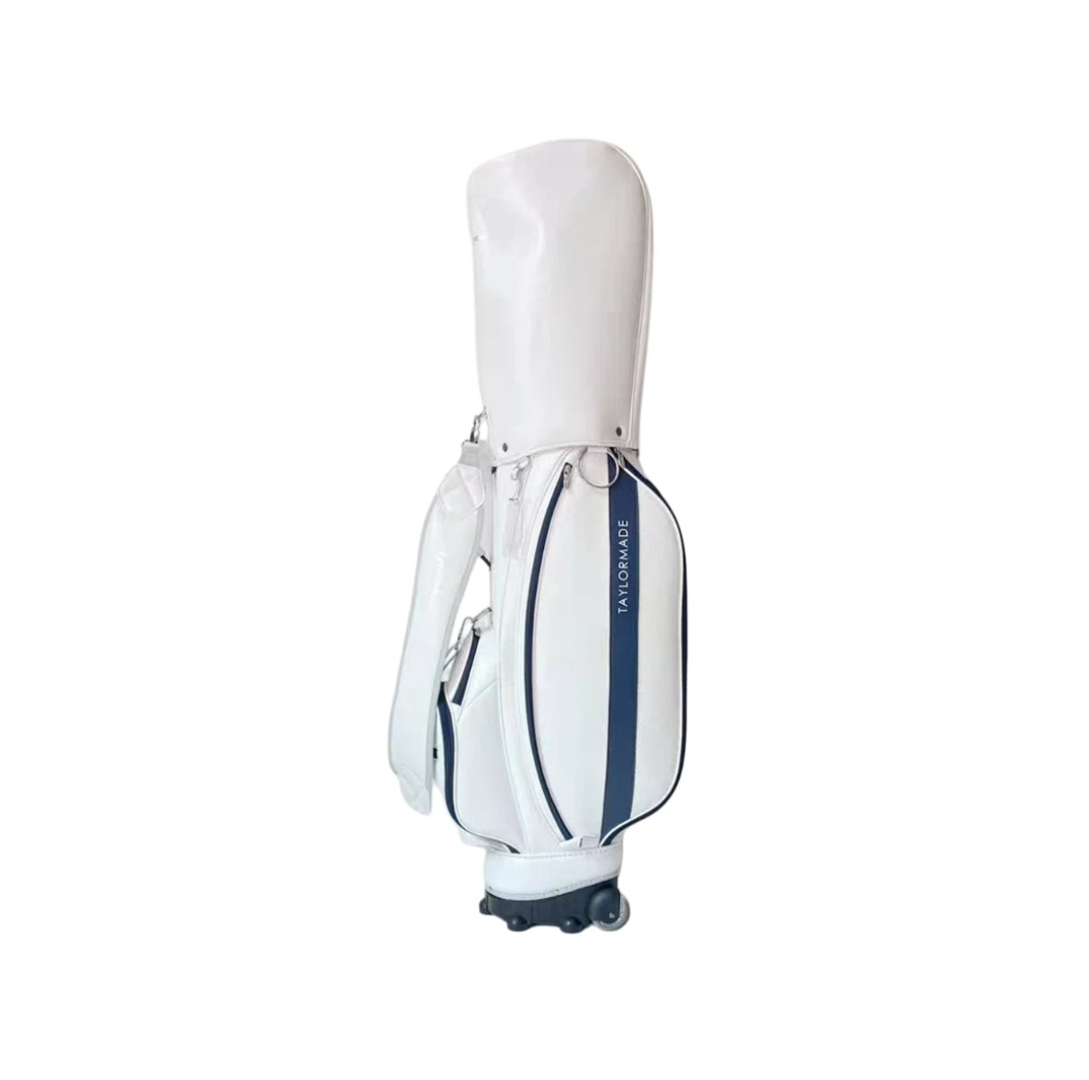 White TaylorMade wheeled caddy golf bag with navy vertical stripe, hood cover and base wheels, side view