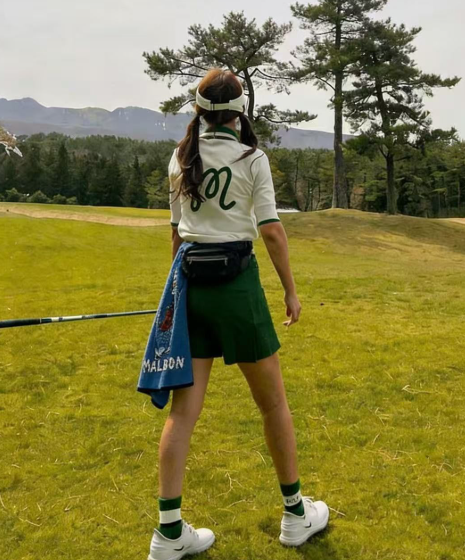 Malbon Limited Edition 2026 Golf Towel with Clip — close-up of microfiber pile