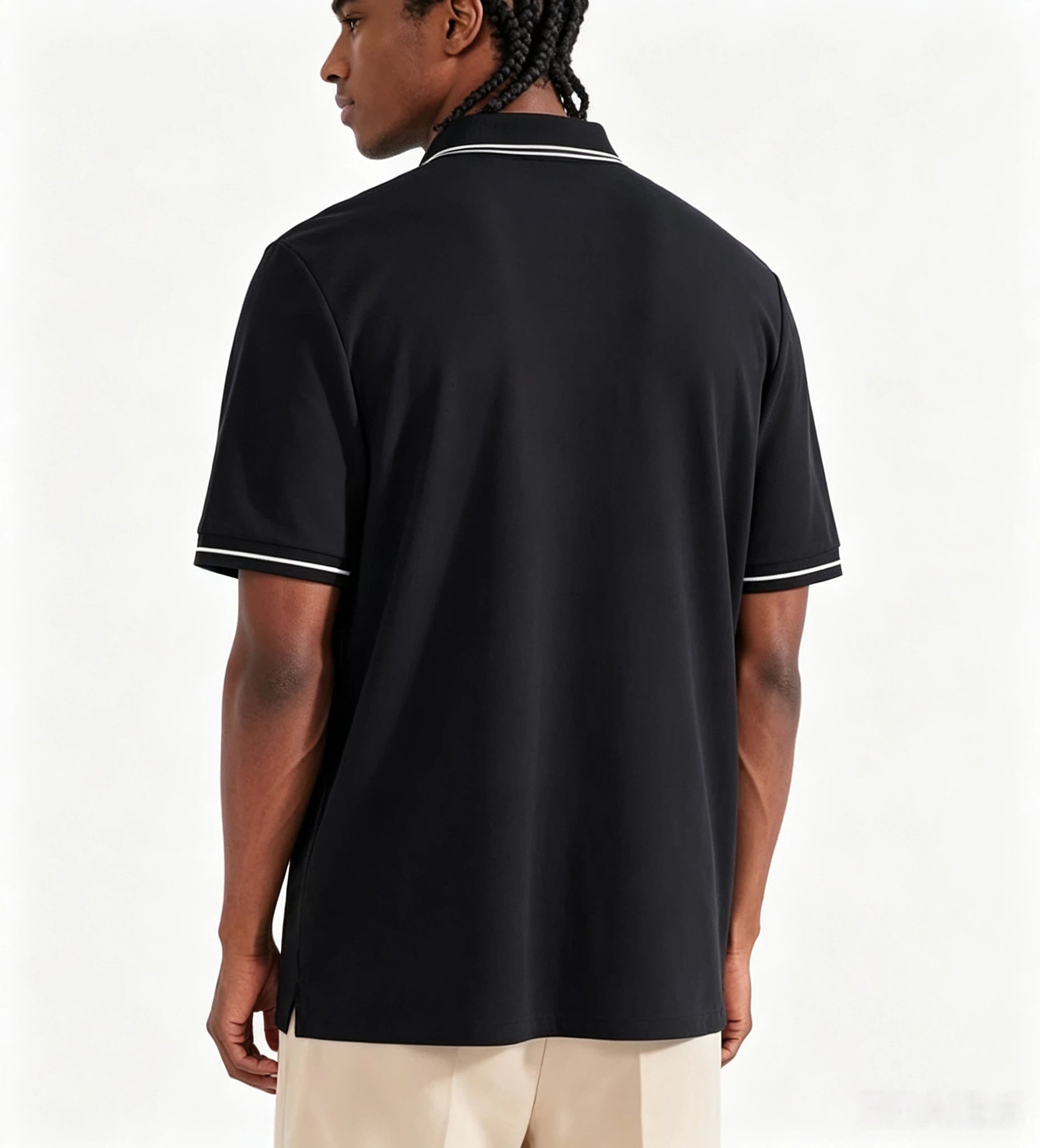 Malbon men's moisture-wicking athletic golf polo in Black - model back view