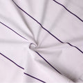 Devereux striped-print golf polo front view on male model