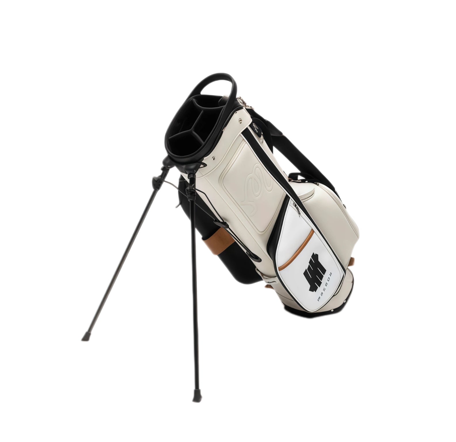 Angled shot of Malbon Golf stand bag with deployed black dual-leg stand system, showcasing lightweight structure, top handle, and clean minimalist design in cream/white finish.