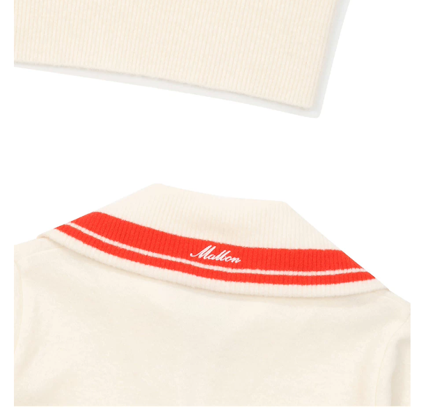 Malbon Women's Collared Knit Long Sleeve Beige knit long sleeve golf top detail view