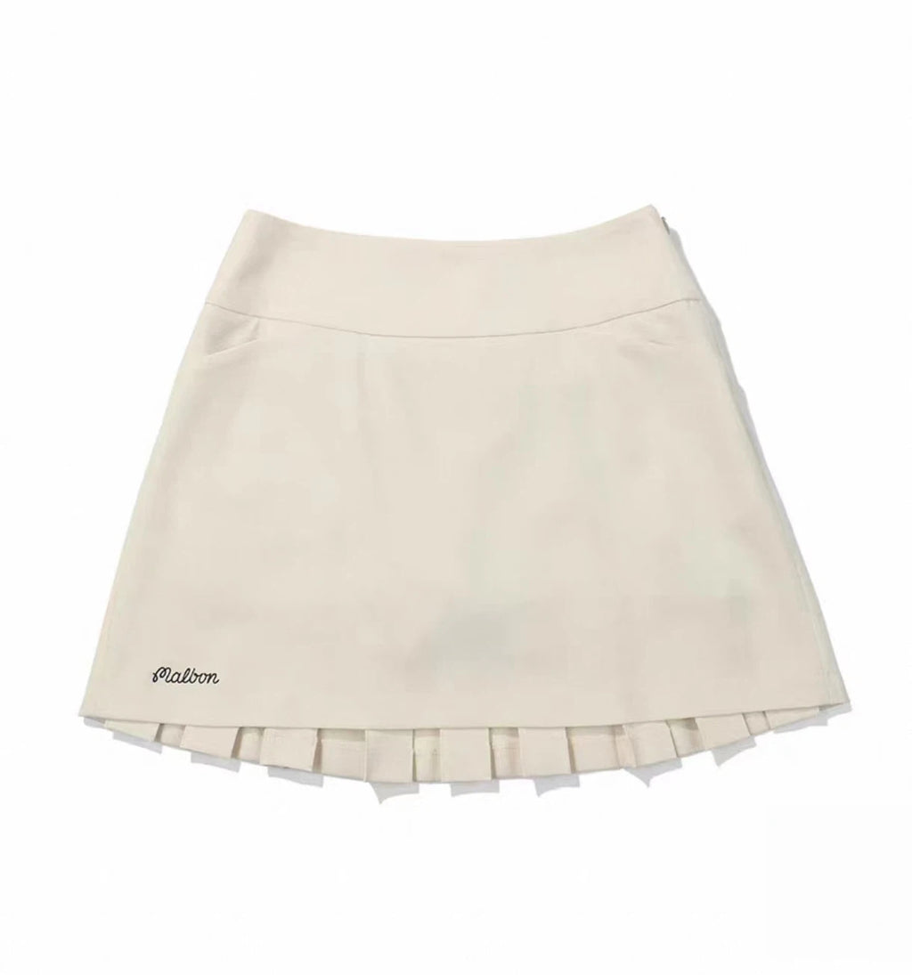 Malbon Women's Logo Pleated Golf Skort Beige pleated golf skort front view