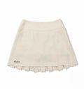 Malbon Women's Logo Pleated Golf Skort Beige pleated golf skort front view