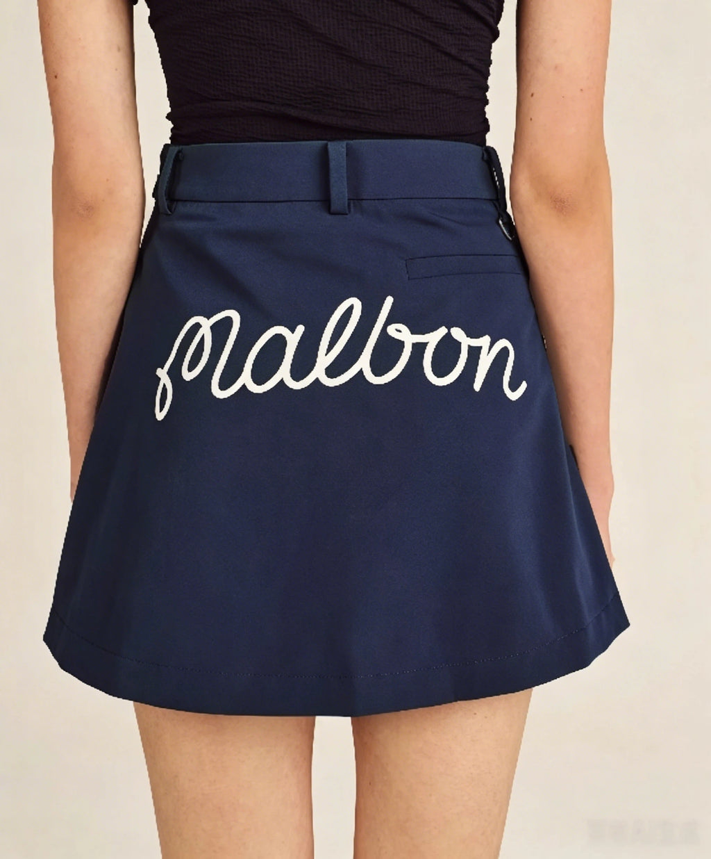 Malbon Studio Seoul Back Logo Skirt Black golf skirt front view