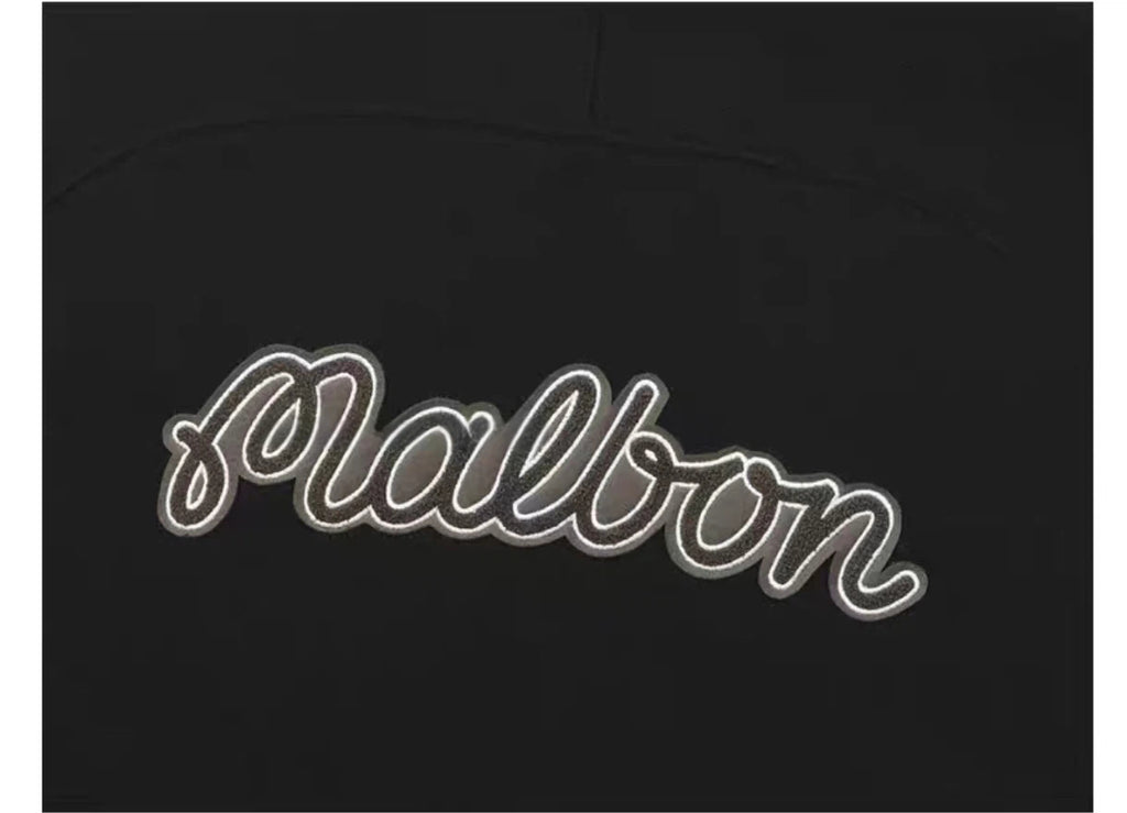Malbon Studio Seoul Tour Divot French Terry Zip-Up Black french terry golf zip-up detail view
