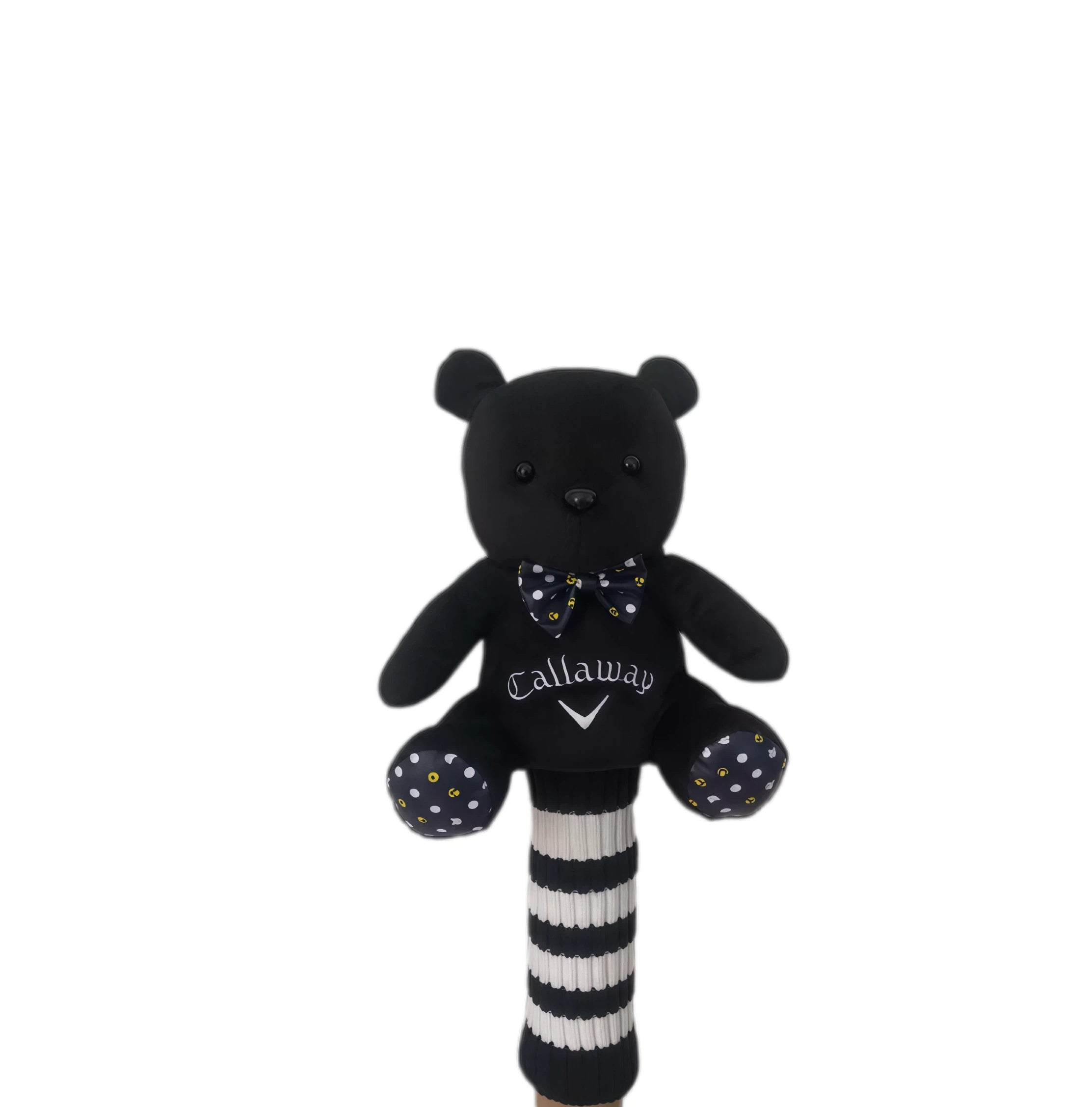 Black cartoon plush bear golf headcover with striped shaft cover and white Callaway logo, shown fitted on golf club for secure protection and playful aesthetic.