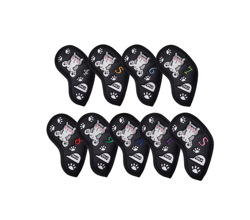 Front view of a black kitten-themed golf headcover set featuring eight pieces with cute cartoon cats wearing sunglasses, paw prints, and numbered labels (4–S), ideal for fairway woods and hybrid clubs.