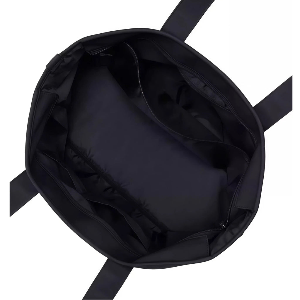 Top-down view of the TaylorMade Black Golf Tote’s interior, showcasing a spacious main compartment with multiple pockets and padded sections for organized storage.