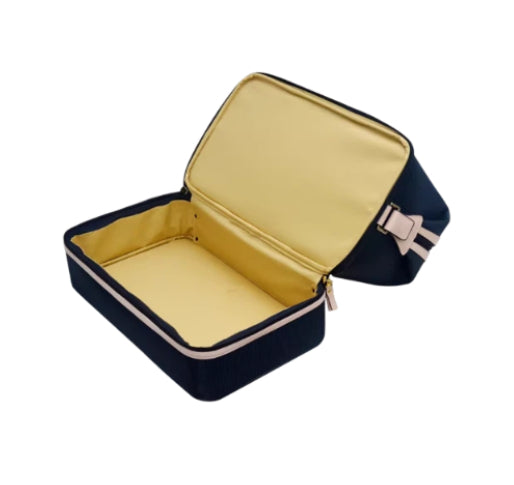 Inside view of the bottom zippered section of the Polo Golf Duffel Bag, revealing a gold-lined insulated compartment ideal for storing cold drinks or golf shoes.

