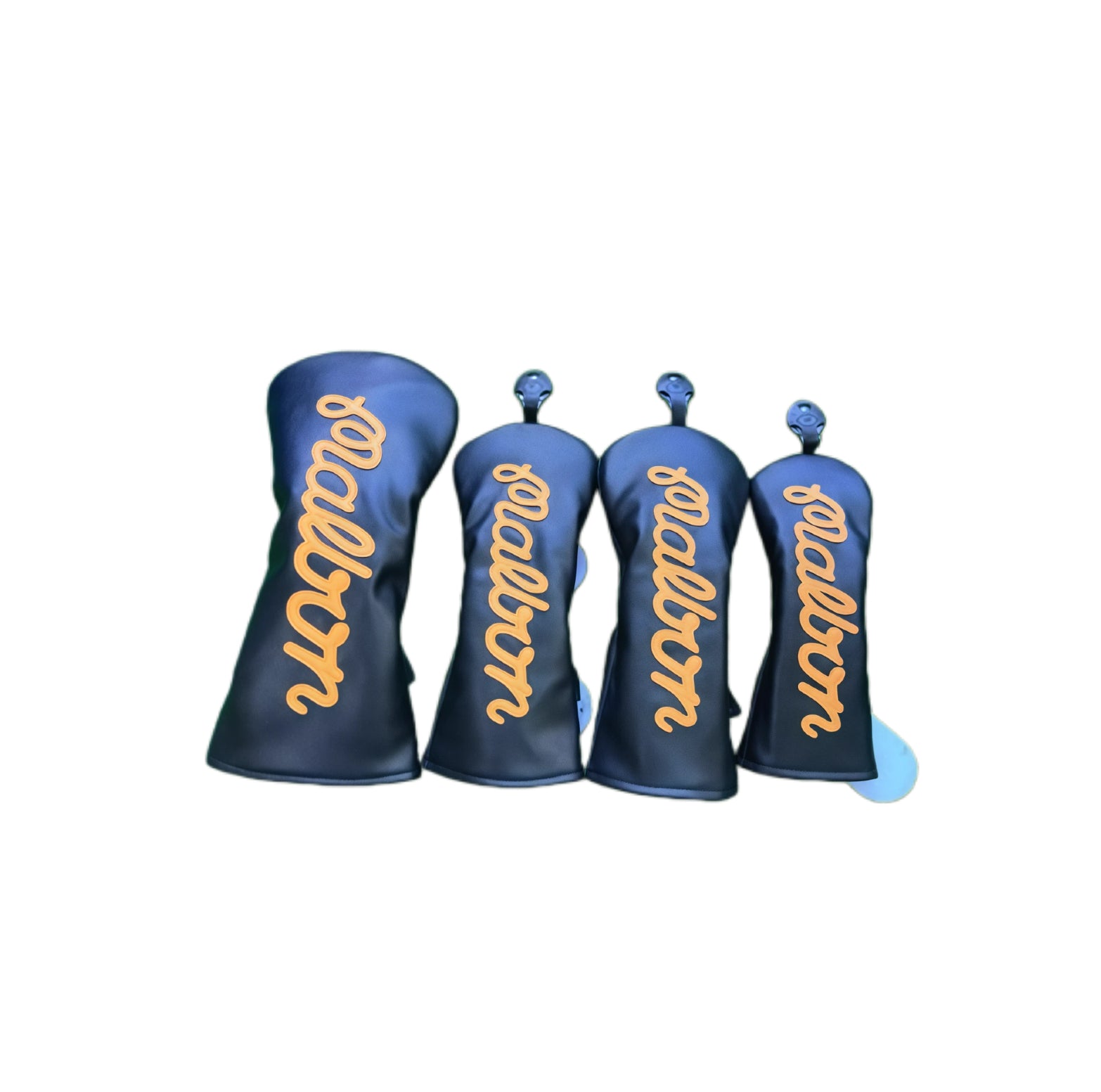 Navy blue Malbon golf driver headcover set with elegant gold "Malbon" script lettering, featuring a sleek and modern design to safeguard your driver and fairway clubs, perfect for golfers who appreciate understated luxury and brand identity.