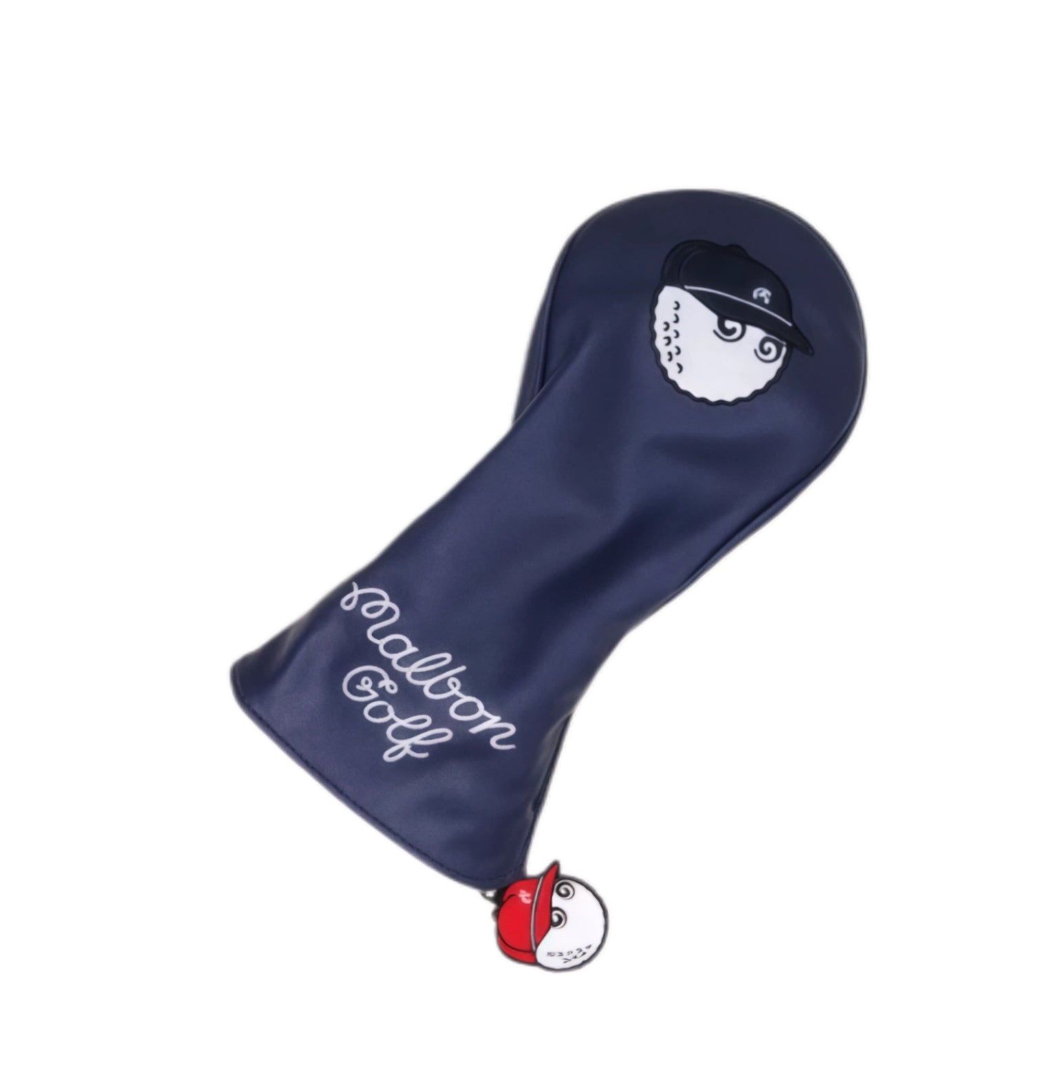 Close-up inside view of black Malbon golf headcover showing soft plush lining, woven “Malbon” brand tag, and hanging plastic charm with red-capped cartoon golf ball character.