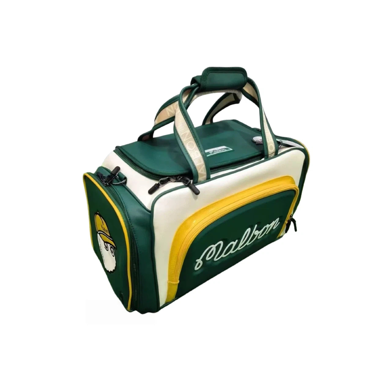 Angled side view of the Malbon Golf M Bucket Boston Bag in green, yellow, and white. Highlights the side pocket with cartoon golf ball mascot, padded top handles, and structured design.