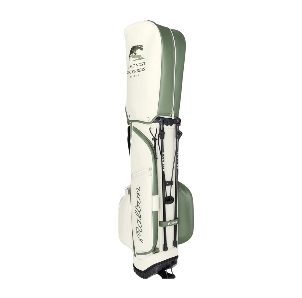 Side view of Malbon Golf Stand Bag with fully extended black stand legs and branded straps. Waterproof PU leather construction with ergonomic design for easy transport.
