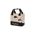 Beige Malbon golf tote bag with black accents, featuring a playful golf ball character in a black cap and matching red cap charm tag; perfect for golf lovers.