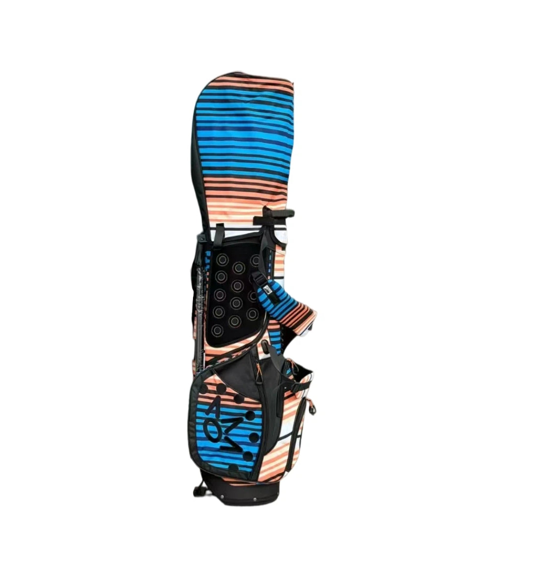 A top-down view of the Scotty Cameron Pathfinder stand bag, showing the arrangement of the club dividers and the top of the multi-color serape pattern.