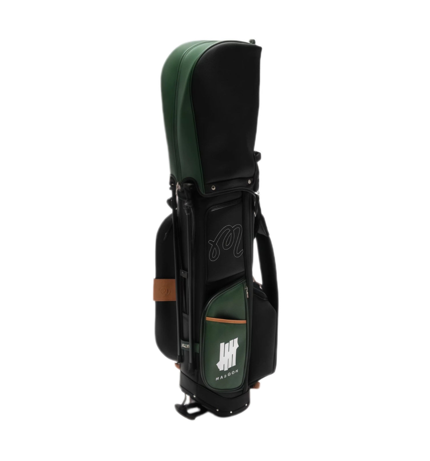 Side profile of Malbon Golf caddy bag showing embossed script logo, green accent panel with white 'HH MALBON' emblem, brown leather trim, and adjustable shoulder strap.