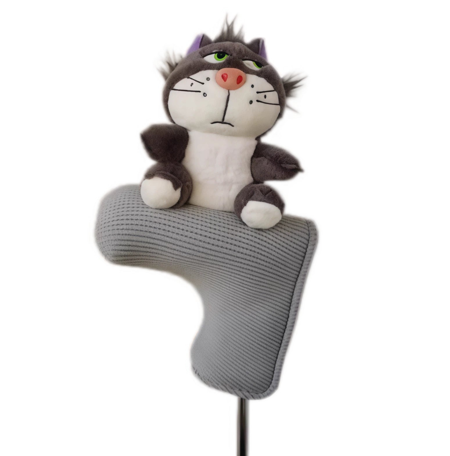 Top-down view of a small gray plush cat sitting on a gray ribbed hybrid or iron headcover, showcasing its playful design and compact fit for mid-iron clubs.
