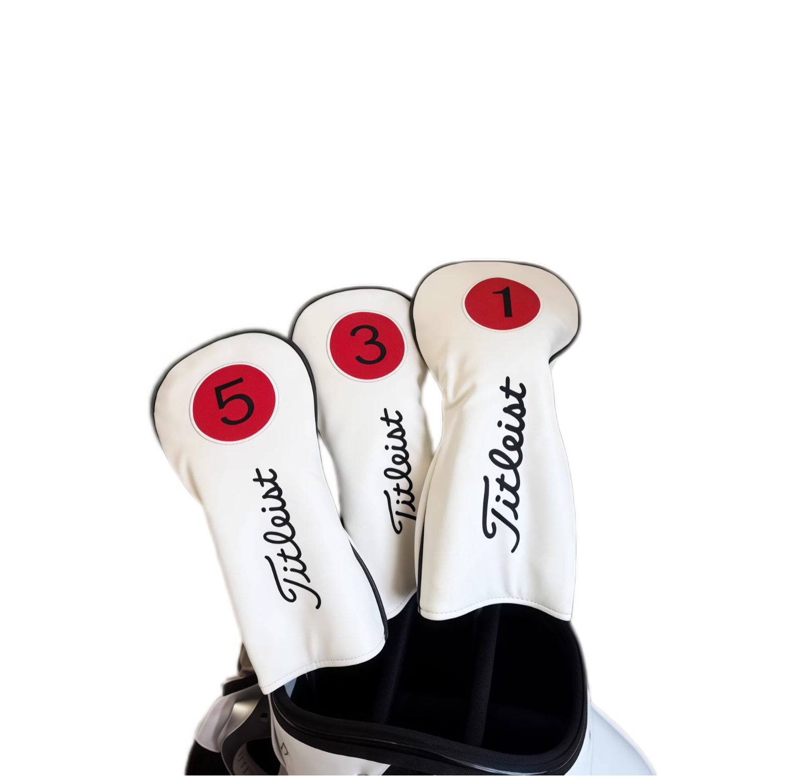 Three white Titleist-style golf headcovers labeled "1", "3", and "5" displayed in a golf bag, featuring red circular number patches and elegant black cursive "Titleist" logo — premium protection for driver, fairway wood, and hybrid clubs.