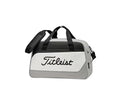 Front view of the Titleist Duffel Bag in white and black featuring a large embroidered "Titleist" logo, dual top handles, and a removable padded shoulder strap. Ideal for golf travel, gym, or weekend trips.