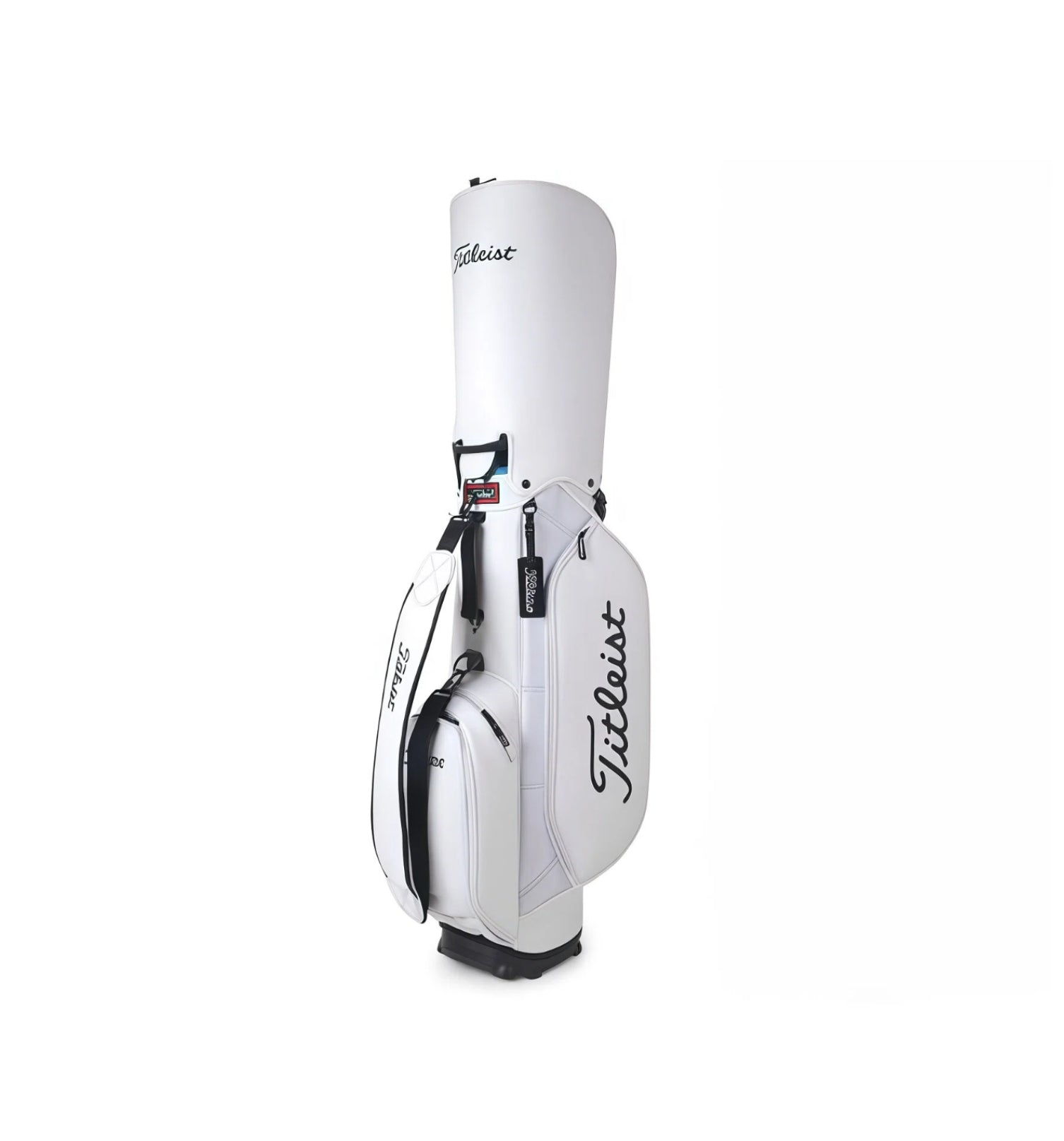 Front-facing view of the Titleist TB23ASBA stand golf bag in white with black detailing. Features a large "Titleist" script logo, zippered side pocket, dual carry handles, and a lightweight, water-resistant exterior perfect for daily use.
