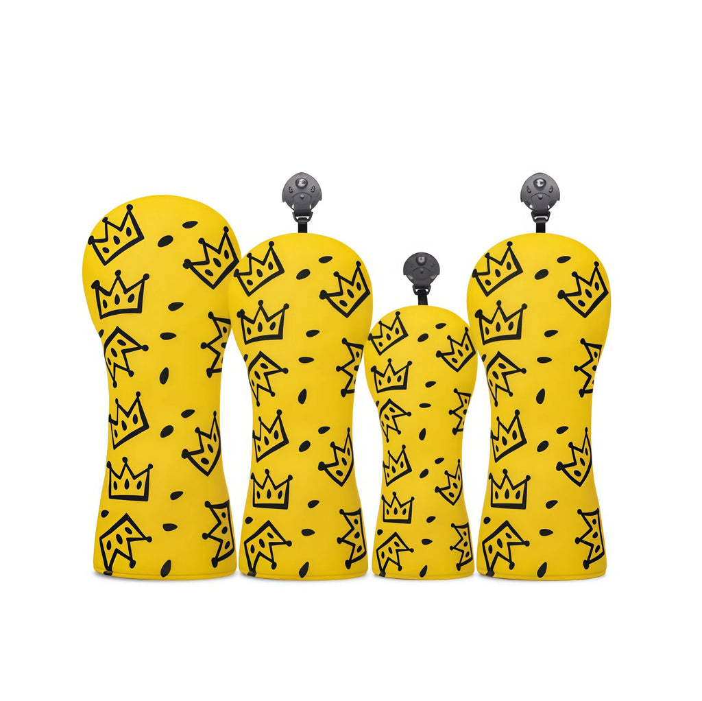 Four yellow golf club heads with black crown pattern on a white background