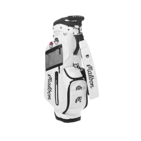 Rear view of white Malbon Golf lightweight stand bag showing mesh pocket, adjustable single shoulder strap with 'Malbon' script, and compact base for easy carrying on course.