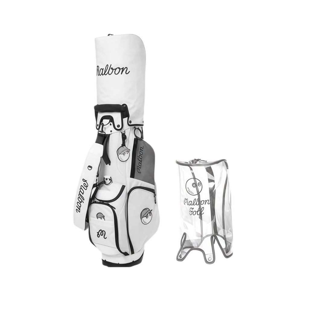 Malbon Golf Lightweight Stand Bag in white with black trim, featuring single shoulder strap, cartoon golf ball mascot patches, and included clear waterproof rain cover.